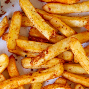 Masala Fries are Spicy French fries coated with herbs, minced garlic, cilantro & spices are Vegan, Nut Free & Gluten Free