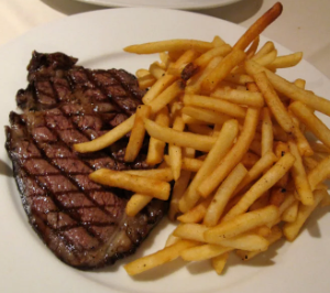 Rib Eye Steak Hearty and delicious as a solid, Certified Angus Beef Rib Eye Steak, served with Asian Spiced Fries and Seasonal Vegetables.